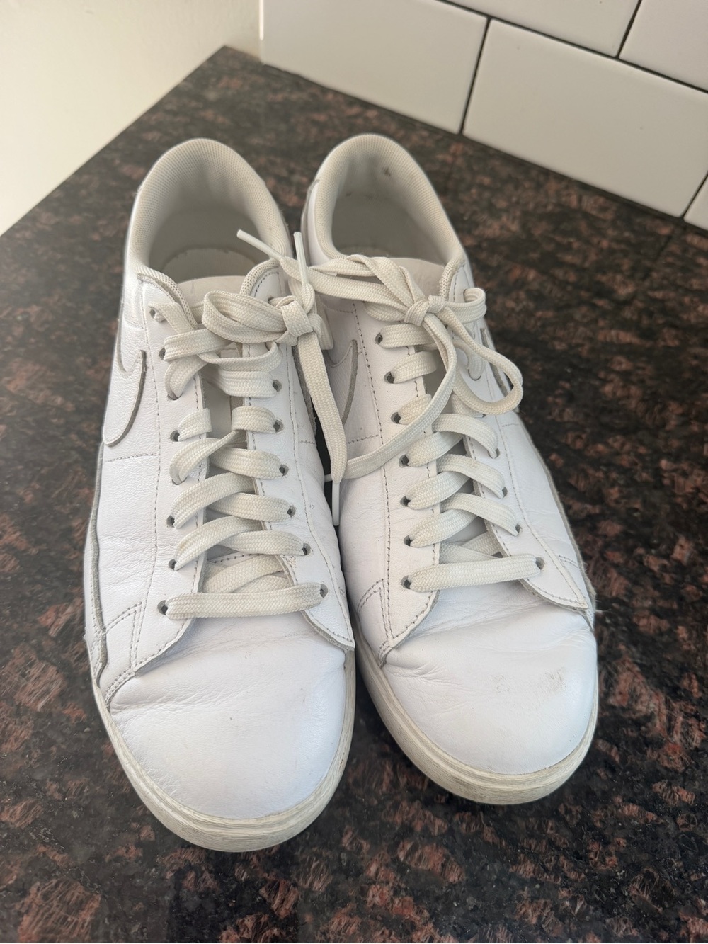 Nike White Leather Low-Top Sneakers with Silver Swoosh